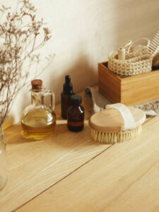 Set of organic beauty products (olive oil and serum) and toiletries