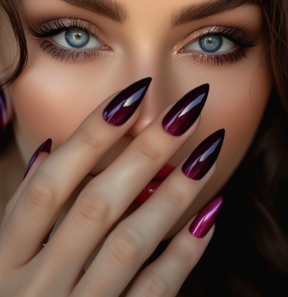 woman with bright nails and blue eyes.