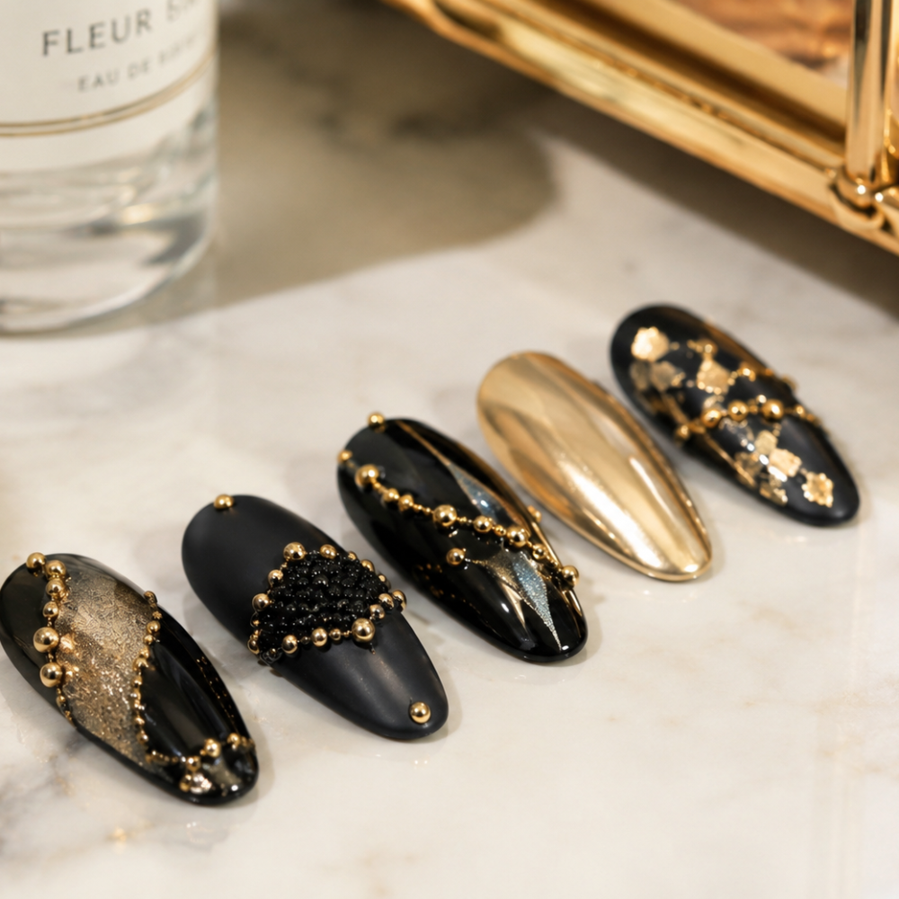 black and gold caviar nails